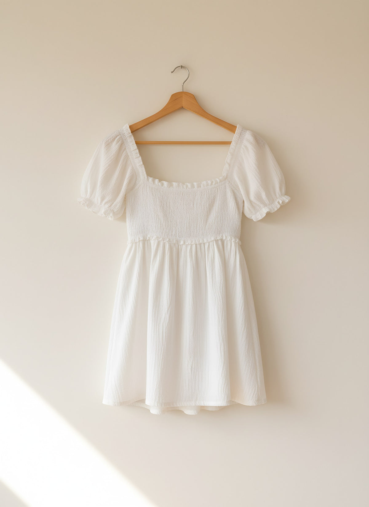 Women's White Summer Mini Dress, front view on a hanger, Molly's Atelier