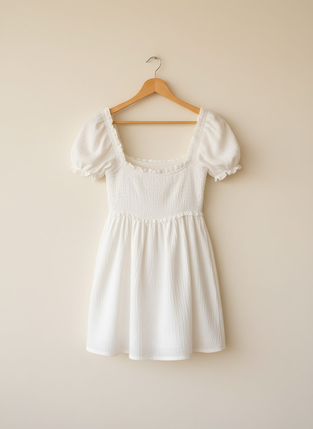 Women's White Summer Mini Dress, back view on a hanger, Molly's Atelier